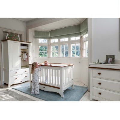 cream baby cot